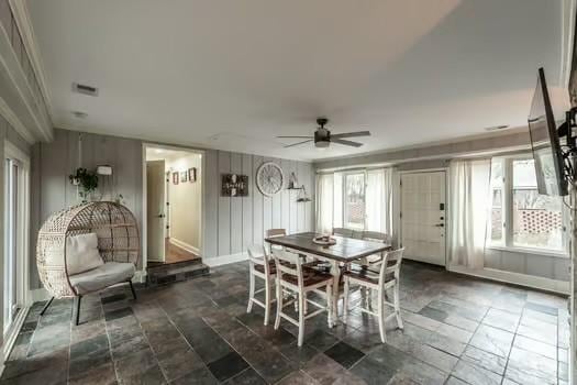 dining area with ceiling fan