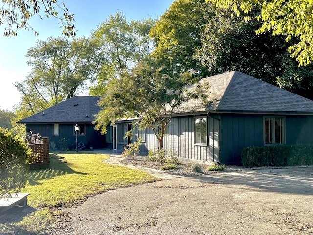 exterior space with a front lawn