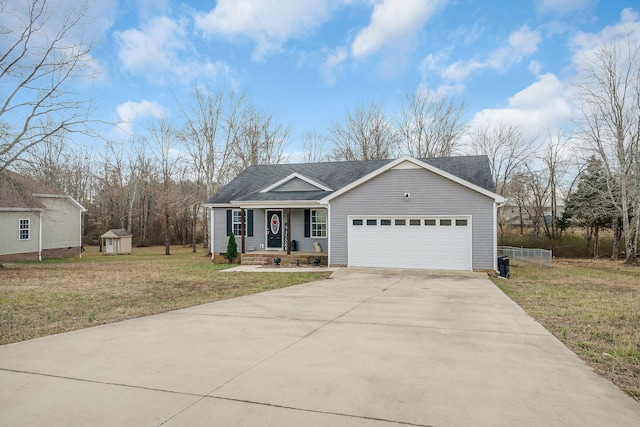 view of front of house with a porch, a garage, a shed, and a front yard