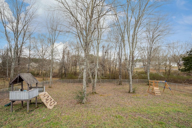 view of yard with a playground