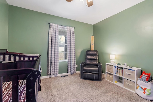 carpeted bedroom featuring ceiling fan