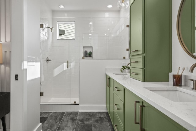 bathroom with walk in shower and vanity