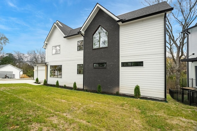 view of home's exterior featuring a lawn