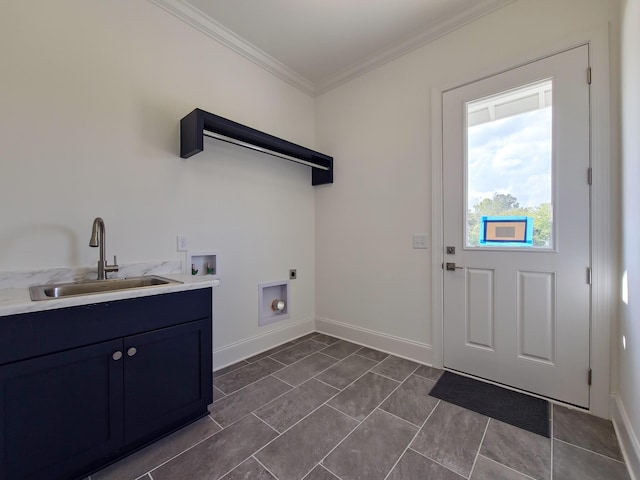 laundry room featuring sink, electric dryer hookup, hookup for a washing machine, cabinets, and ornamental molding