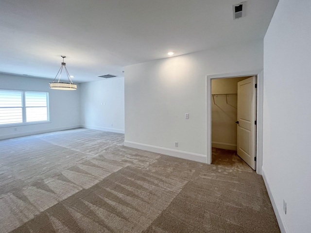 empty room featuring carpet floors