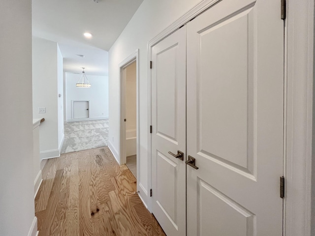 hallway featuring light wood-type flooring