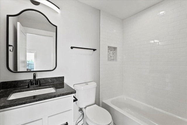 full bathroom featuring vanity, tub / shower combination, and toilet