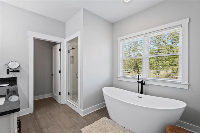 bathroom with vanity and plus walk in shower