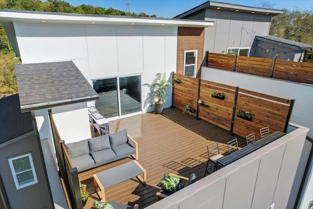 wooden deck featuring an outdoor living space