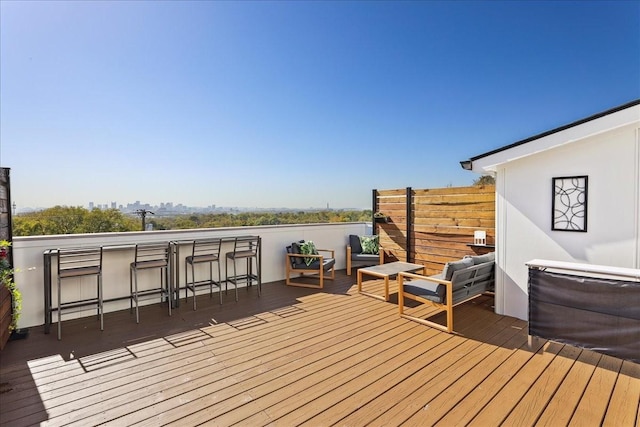 wooden deck with an outdoor bar