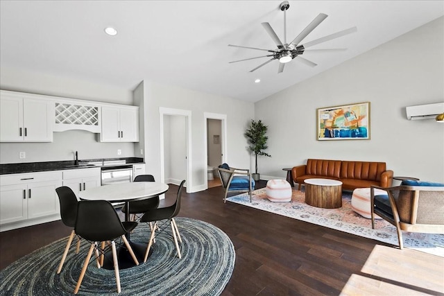 dining space with a wall mounted air conditioner, lofted ceiling, ceiling fan, dark wood-type flooring, and wet bar