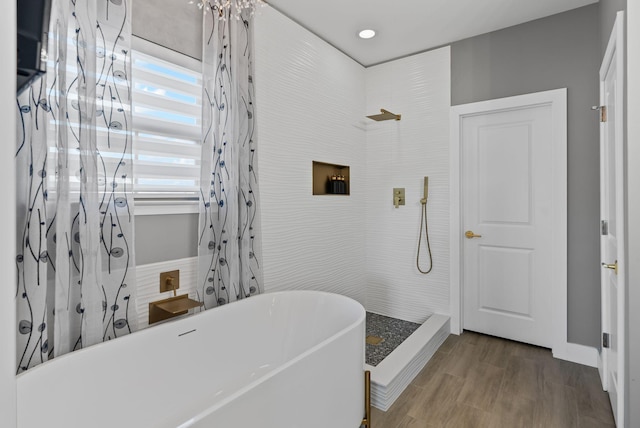 bathroom featuring plus walk in shower