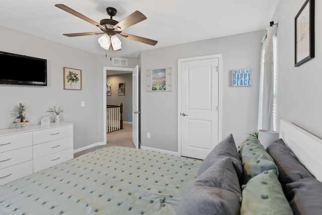 bedroom with light colored carpet and ceiling fan