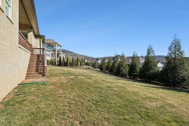 view of yard with a mountain view