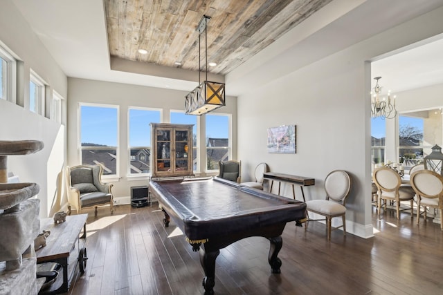 rec room with wood ceiling, pool table, dark hardwood / wood-style floors, and a chandelier