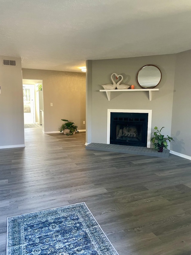 living room with dark hardwood / wood-style flooring