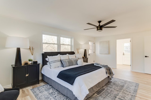 bedroom featuring ceiling fan and light wood-type flooring