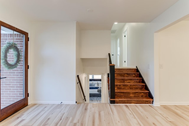 foyer featuring light wood-type flooring