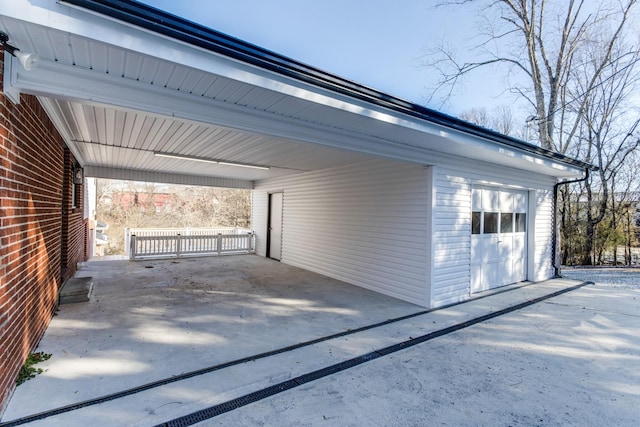 garage with a carport