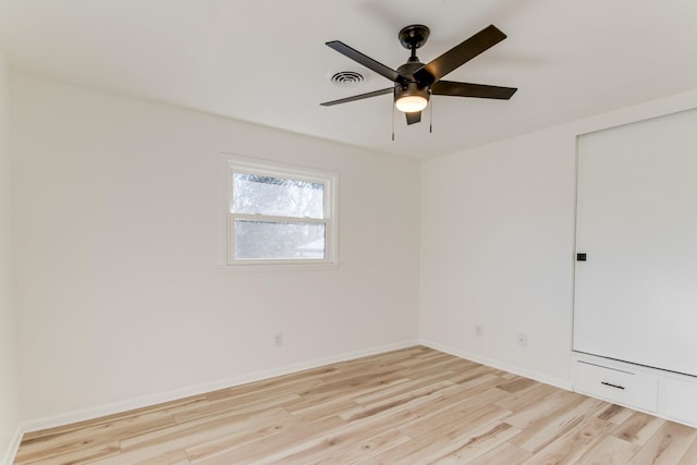 unfurnished room with ceiling fan and light hardwood / wood-style flooring