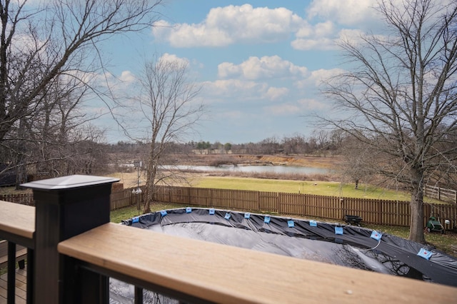 wooden terrace featuring a covered pool