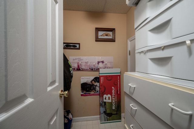 interior space featuring a drop ceiling