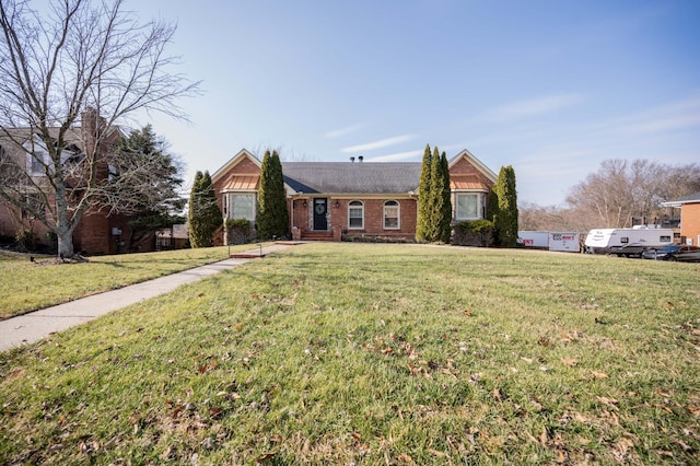 single story home featuring a front yard