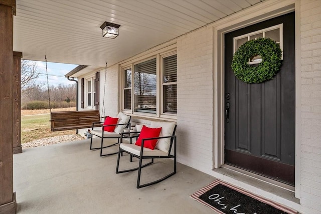 entrance to property with a porch