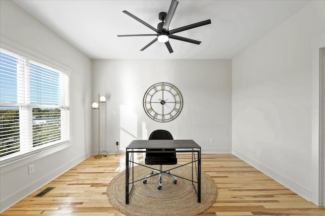 office featuring ceiling fan and light wood-type flooring