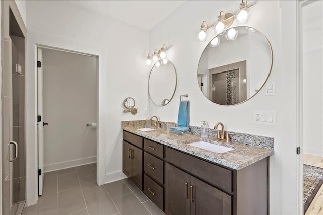 bathroom with vanity and tile patterned floors