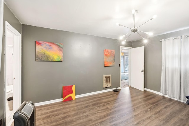 interior space featuring dark wood-type flooring and heating unit