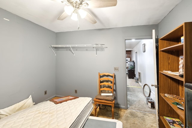 bedroom featuring light carpet and ceiling fan