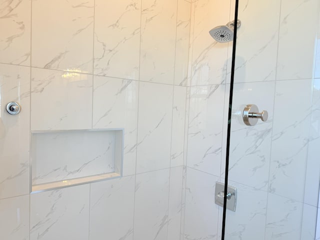 details featuring a tile shower