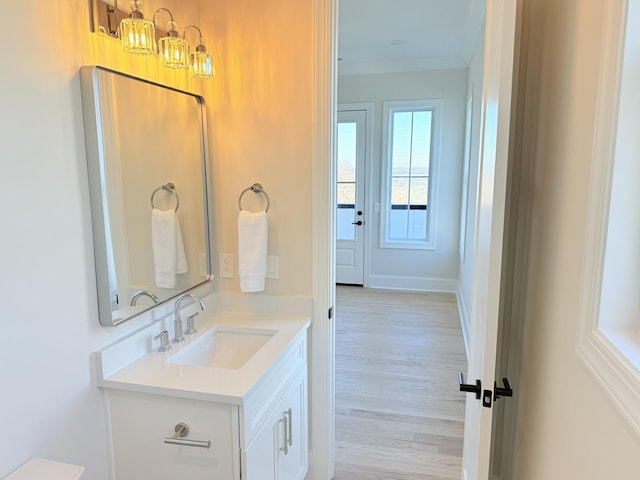 bathroom featuring vanity and hardwood / wood-style floors