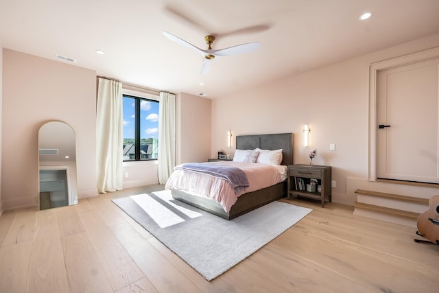 bedroom featuring ceiling fan and light hardwood / wood-style floors