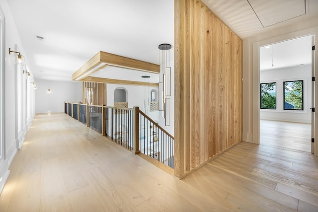 corridor featuring light hardwood / wood-style flooring