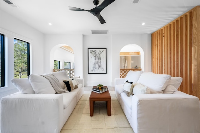 living room featuring ceiling fan