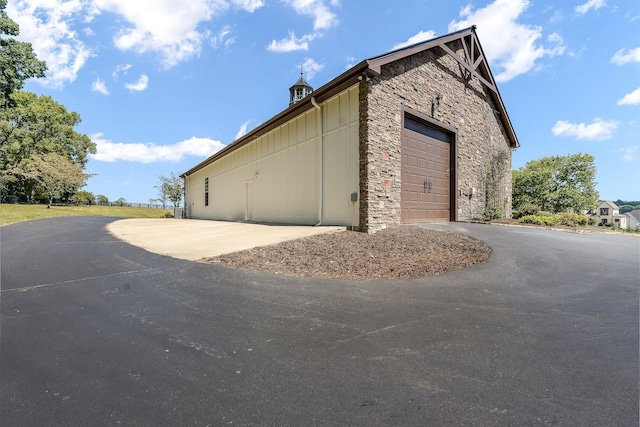 view of home's exterior featuring a garage