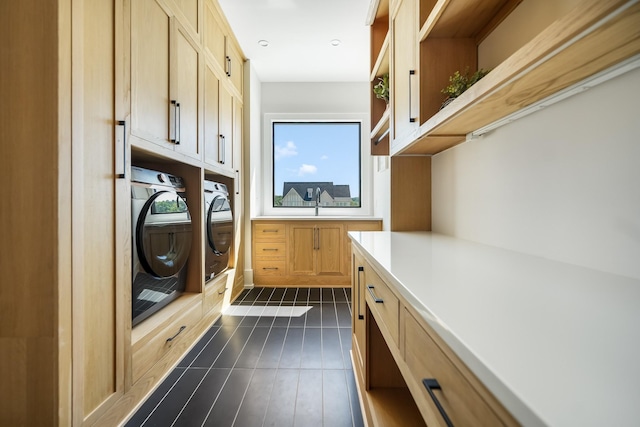 mudroom with washing machine and dryer