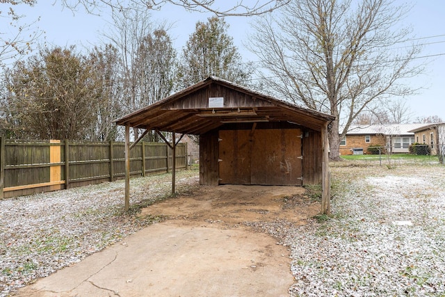 view of outdoor structure with a carport