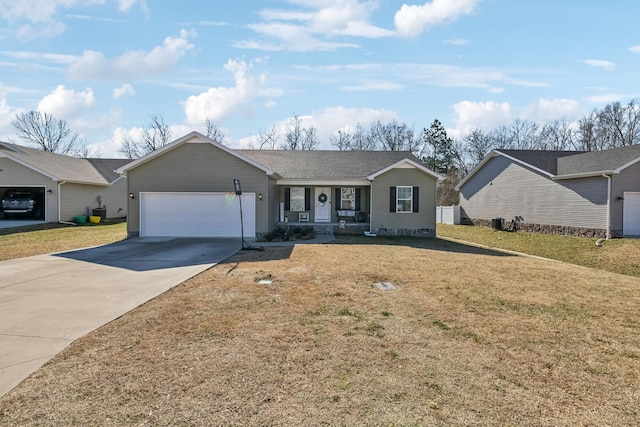 ranch-style home with a garage, covered porch, and a front lawn