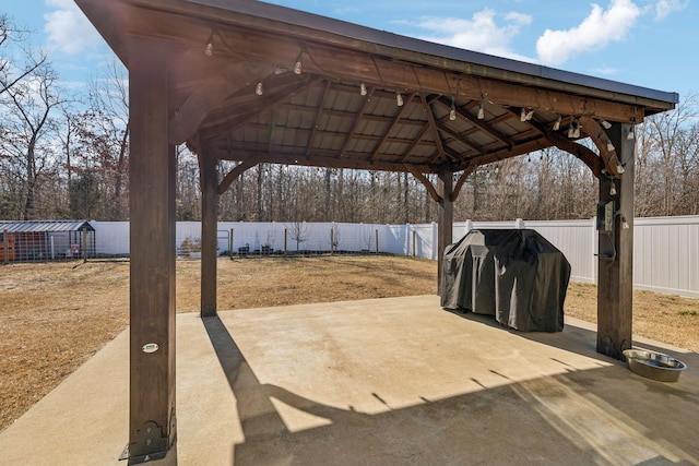 view of patio / terrace featuring a gazebo and area for grilling