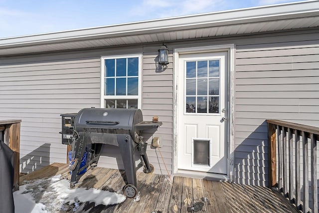 doorway to property with a deck