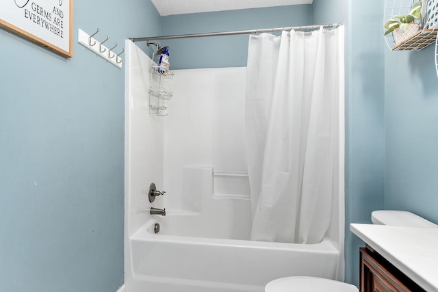 full bathroom featuring vanity, toilet, and shower / tub combo