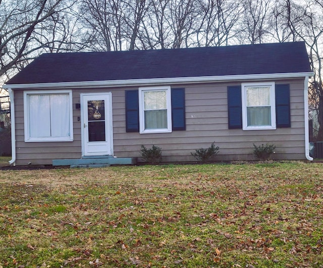 ranch-style home with a front yard