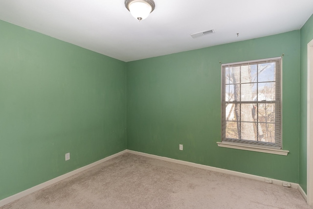 view of carpeted spare room