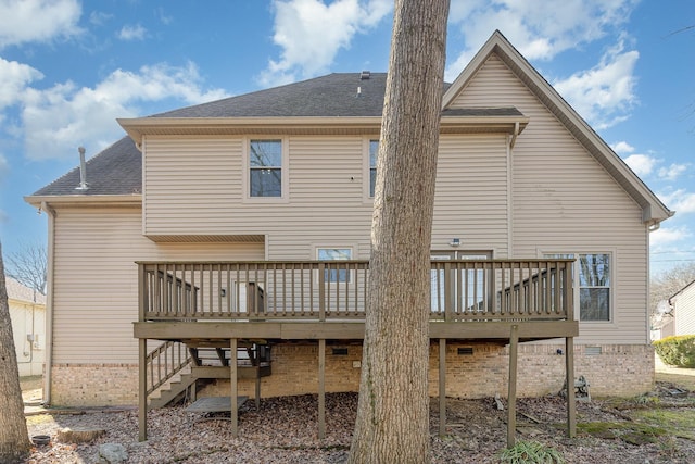 rear view of property with a deck