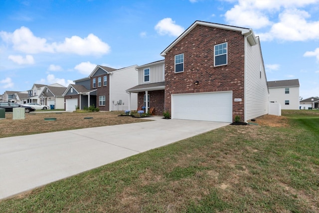 view of front property with a garage and a front lawn