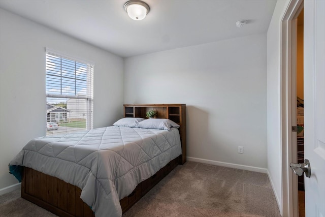 bedroom featuring carpet