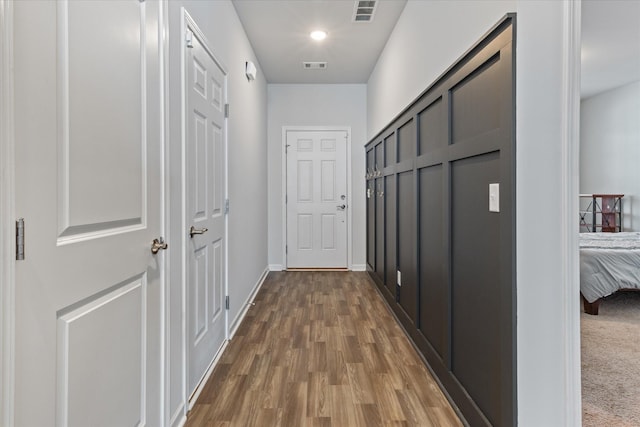 hall with dark hardwood / wood-style floors